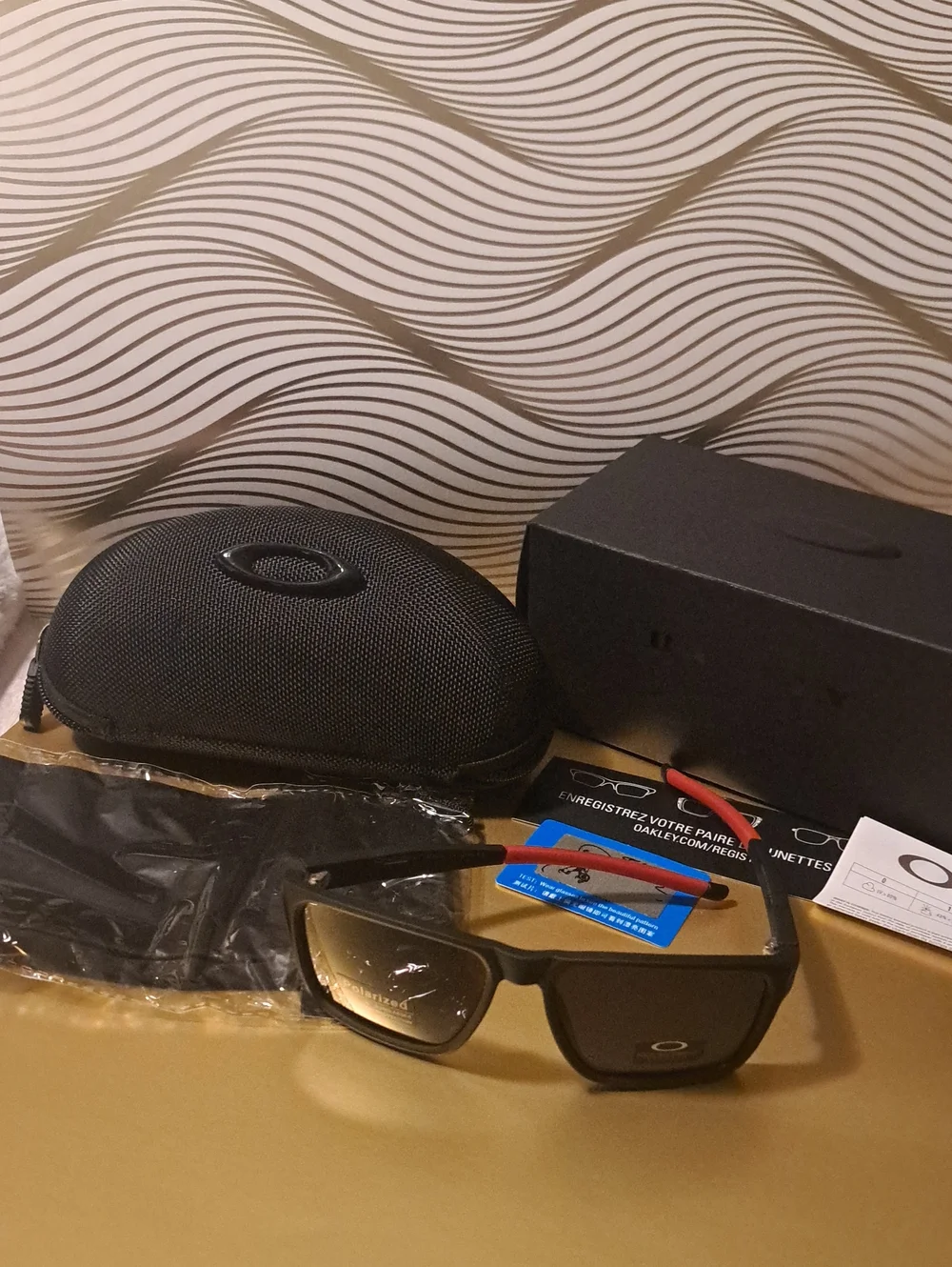 Oakley Men’s Black Frame Sunglasses with Smoke Lenses